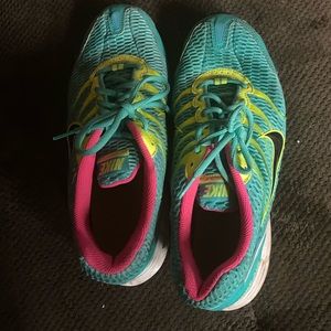 Blue and pink max air nike tennis shoes